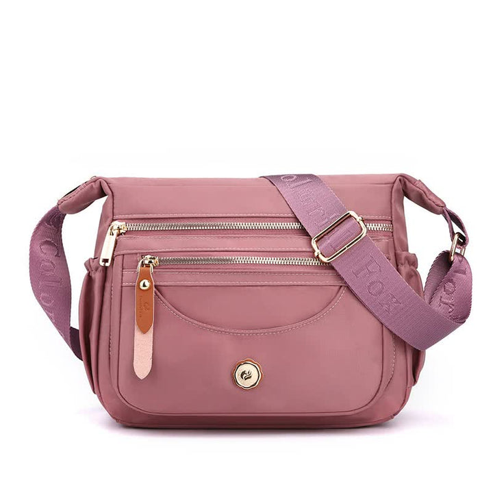 Purple Nylon Crossbody Bag with Multiple Compartments - Compact and Stylish Design