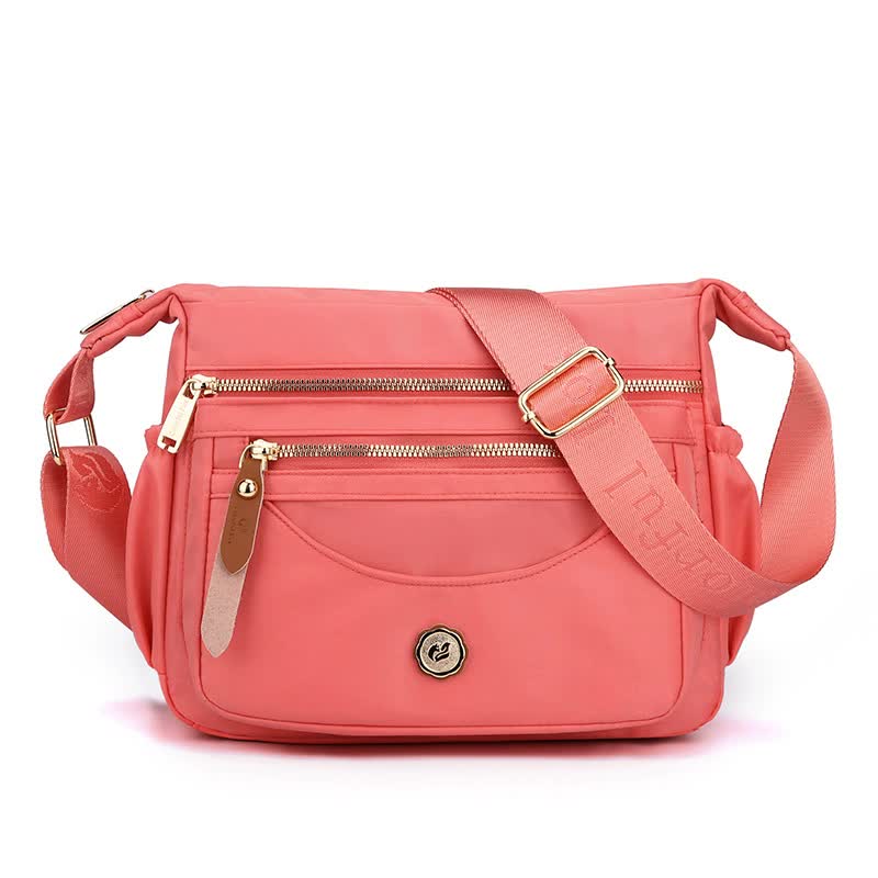 Pink Nylon Crossbody Bag with Multiple Compartments - Compact and Stylish Design